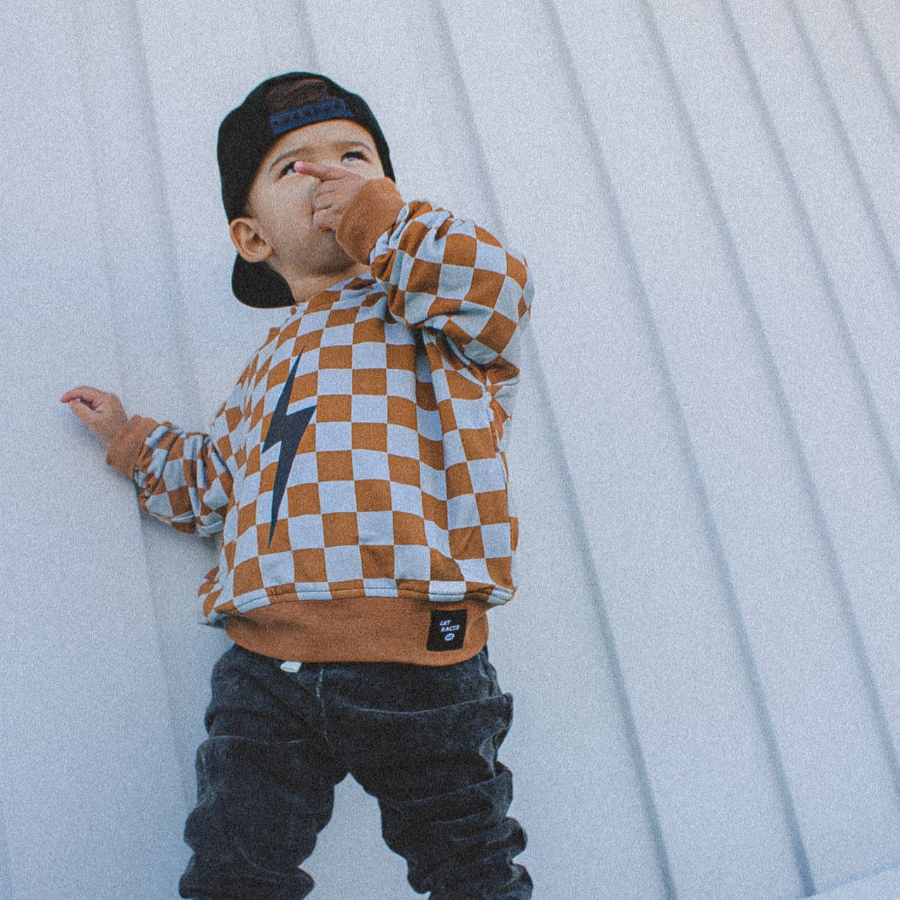 THE CHECKERED SPARK HOODIE - RUST
